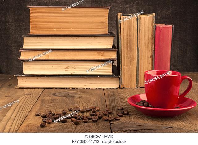 Old Books on Wood Table With Coffee Beens
