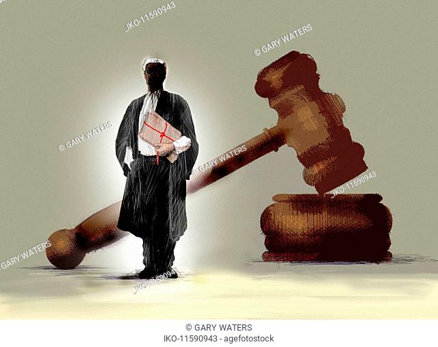 Barrister holding legal documents in front of large gavel