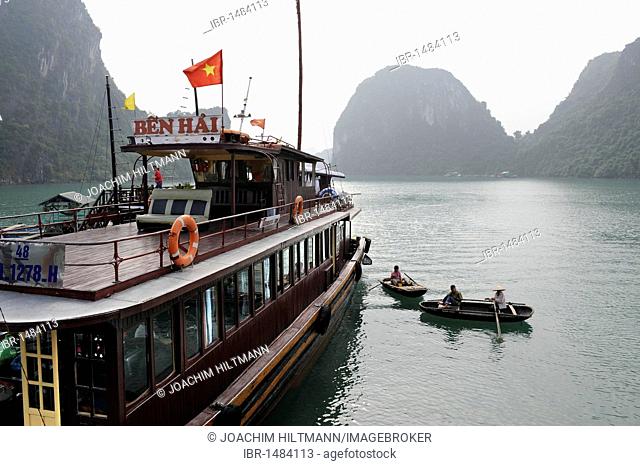 Ship and rowing boats in Halong Bay, Vinh Ha Long, North Vietnam, Vietnam, Southeast Asia, Asia