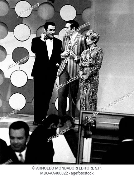Pippo Baudo, Alberto Lupo and Sandra Mondaini in Un Disco per l'Estate. Italian TV presenter Pippo Baudo (Giuseppe Raimondo Vittorio Baudo) joking with Italian...