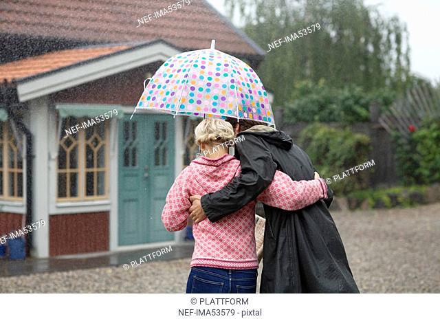 A man and a woman under an umbrella, Sweden