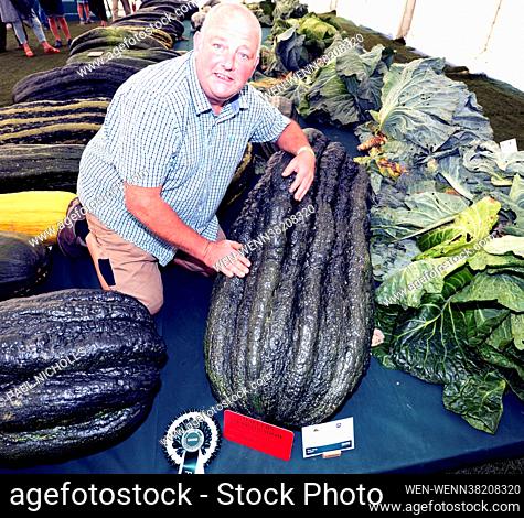 Vincent Sjodin with his new Guiness World Record winning heaviest Marrow 116.4 kg at the Malvern Autumn Show Canna UK National Giant Vegetables Championships...