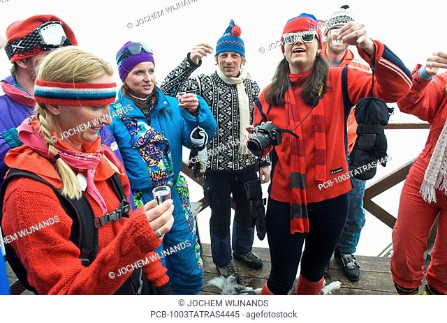 Slovakia, Jasna, group of instructors dressed up to the eighties celebrating the end of the season