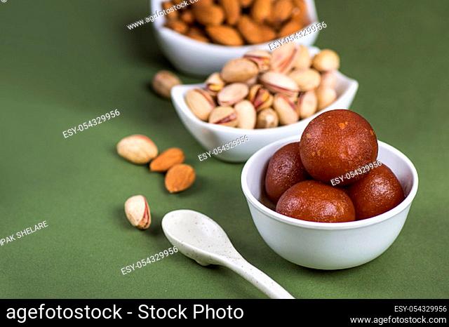 Indian Dessert : Gulab Jamun with Almond and Pistachio