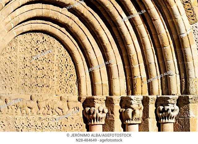 Semi-circular arch in the entrance to Romanesque Collegiate church of San Pedro en Cervatos. Campoo de Enmedio region. Cantabria. Spain