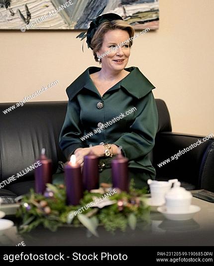 05 December 2023, Berlin: Queen Mathilde of Belgium sits on a sofa in the red town hall. The royal couple will be in Germany until December 7