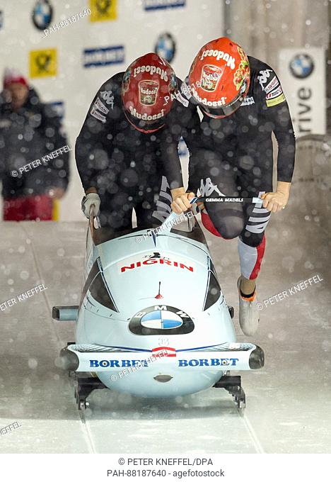 The Austrian bobsleigh team with Christina Hengster (front) and Jennifer Jantina Oluumi Desire Onasanya in action during the 1st two-women run of the FIBT World...