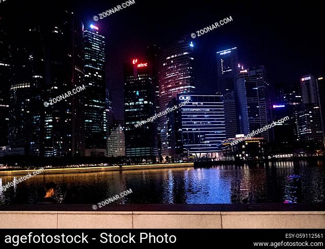 Singapore city skyscrapers landscape and skyline at night