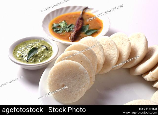 Idli with Sambar and coconut chutney, Indian Dish : south Indian favourite food rava idli or semolina idly or rava idly, served with sambar and green coconut...