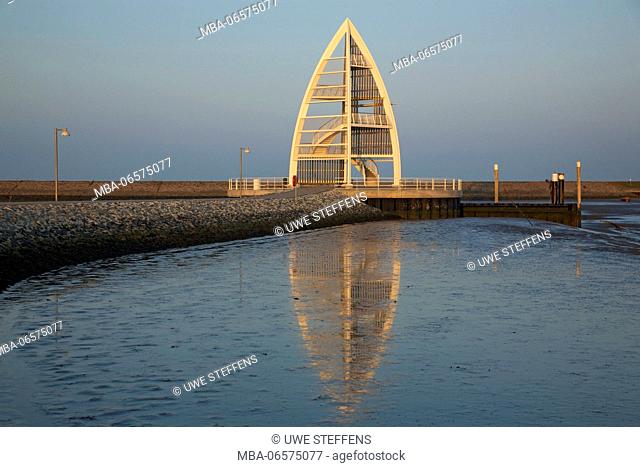 The observation tower like a sail in the harbour of the East Frisian island Juist