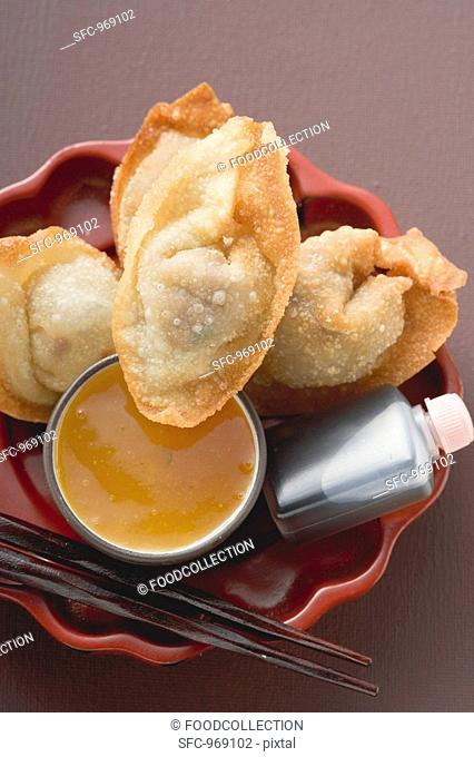 Deep-fried dim sum with two sauces Asia