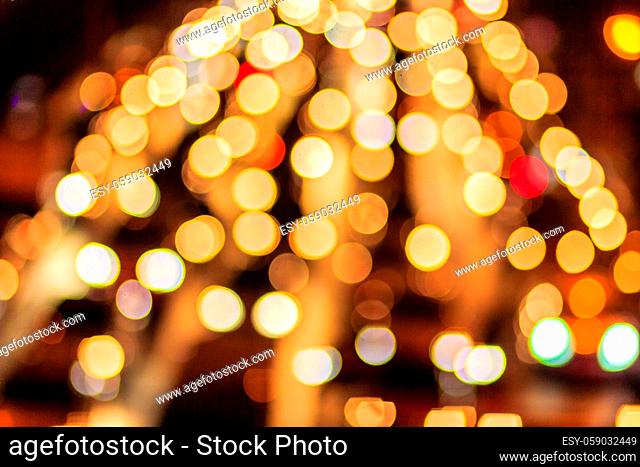 Abstract blur bokeh of Evening traffic jam on road in city. Out of focus lights from cars in a traffic jam. Defocused lights car traffic jam of a street road at...