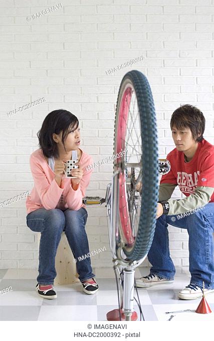 Young people and bicycle