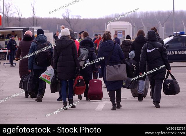 Isaccea, Romania. 08 March, 2022. Refugee Ukrainians walk from Ukraine to Isaccea in Romania after crossing the border