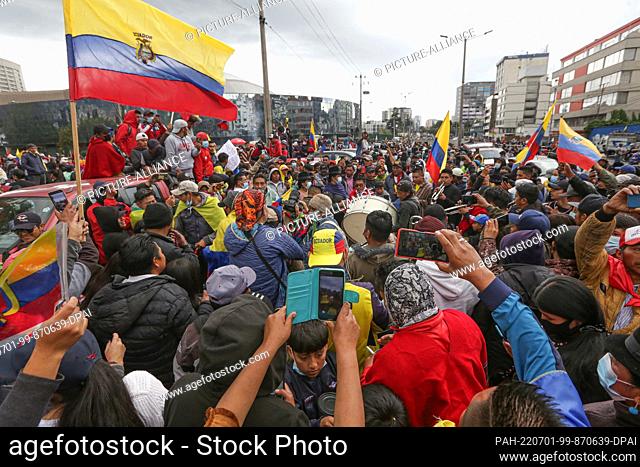 30 June 2022, Ecuador, Quito: Hundreds of indigenous people who had come to the capital to demonstrate in front of the Casa de la Cultura celebrate after the...