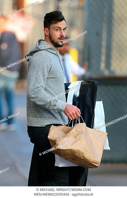 Mathew Paetz seen arriving at the ABC studios carrying clothing bags for Lea Michele who is appearing on Jimmy Kimmel Live Featuring: Mathew Paetz Where: Los...