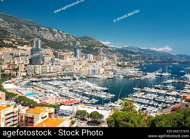 Monaco, Monte Carlo Cityscape. Real Estate Architecture On Mountain Hill Background. Many High-rise Buildings In Downtown Area