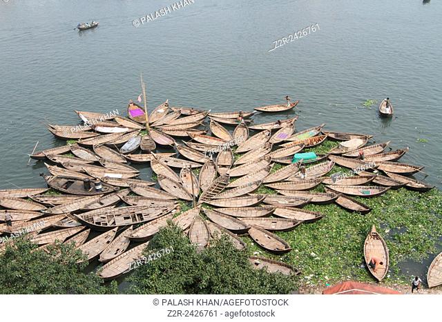 BANGLADESH, Dhaka : Bangladeshi boatmen are seen with their skiffs at the Sadarghat launch terminal during a nationwide strike called by the opposition...