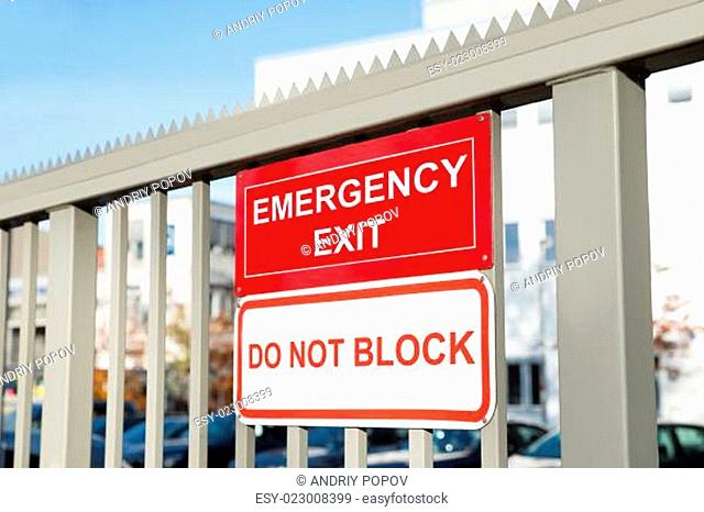 Emergency Exit And Do Not Block Signboard