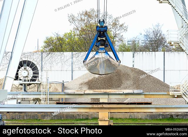 Germany, Hesse, Frankfurt, excavator bucket at a gravel warehouse