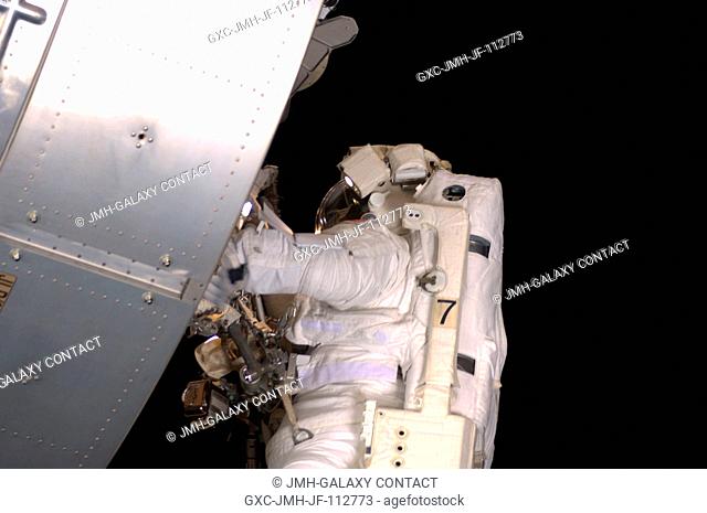 Astronaut Steve Bowen, STS-126 mission specialist, participates in the mission's fourth and final scheduled session of extravehicular activity (EVA) as...