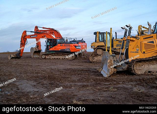 Construction site with excavator and bulldozer in summer