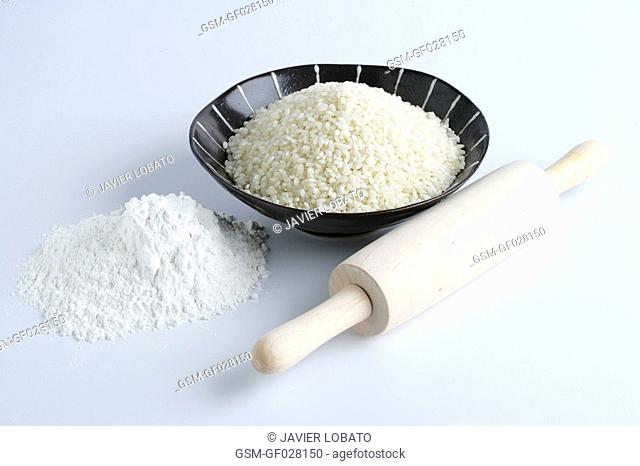Rice flour and round grain rice and rolling pin