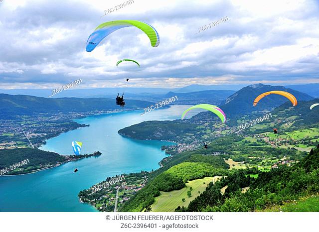 Paragliders above the lake of Annecy, Haute-Savoie, French Alps, France