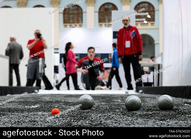 RUSSIA, MOSCOW - MARCH 1, 2023: Playing petanque at a forum titled ""We Are Together: Sport"" at Gostiny Dvor. Anton Novoderezhkin/TASS
