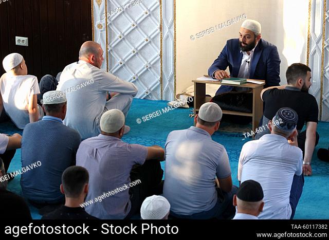 RUSSIA, REPUBLIC OF CRIMEA - JUNE 28, 2023: Imam Mesfer and Muslim believers are seen in Yan'y Jami Mosque in the town of Saki during Eid al-Adha (or Kurban...