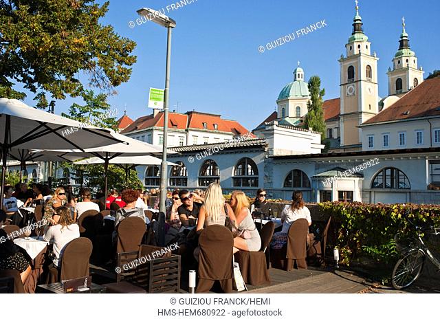 Slovenia, Ljubljana, capital town of Slovenia, cafe terraces on the banks of the Ljubljanica river