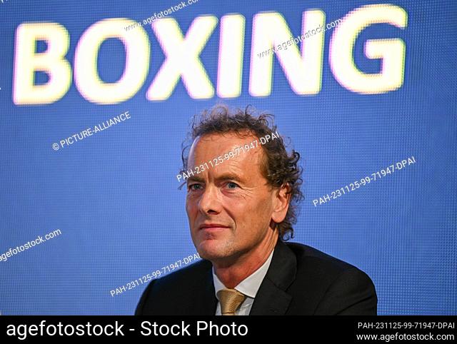 25 November 2023, Hesse, Frankfurt/Main: Boris van der Vorst from the Netherlands, candidate for the post of president, sits in front of the word ""Boxing"" at...