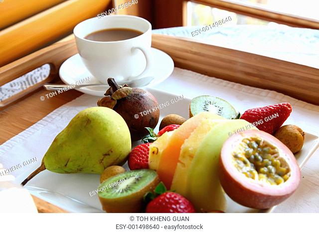 Tropical fruits tray breakfast