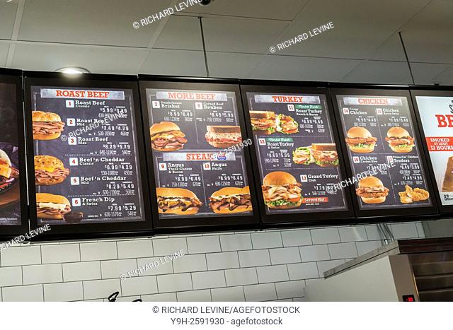Menu board in the new Arby's fast casual restaurant in Midtown in New York. The new Arby's is slated to open in Manhattan binging their mountains of meat to...
