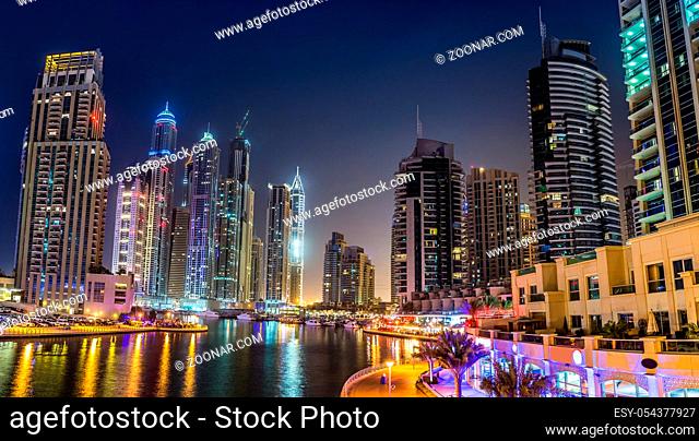 Dubai downtown night scene. Modern skyscrapers in Dubai in a summer night