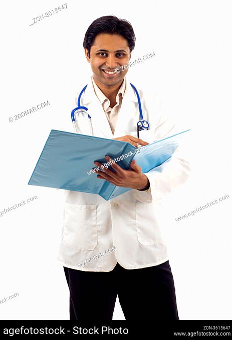 Friendly Asian Indian doctor with stethoscope and folder isolated over white background