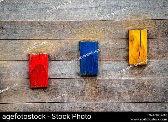 wooden wall with colorful wooden stairs