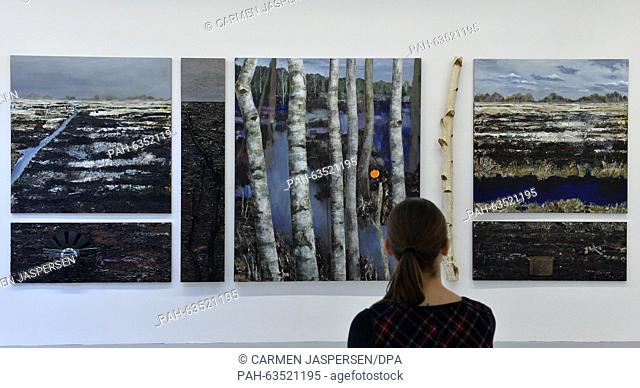 A visitor looks at the artwork ""Im Moor"" (2015) by Viktoria Diehn at the art gallery in Worpswede, Germany, 12 November 2015
