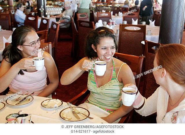 Vista Dining Room, high tea, teen girls. Holland America Line, MS Noordam. New York. USA