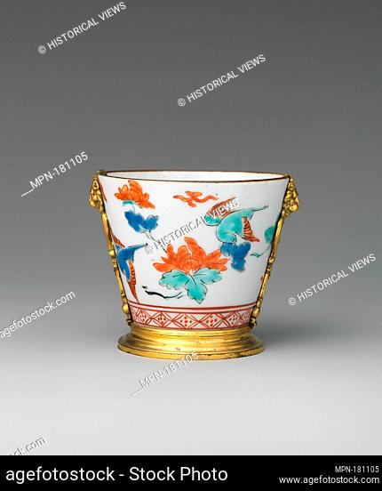 Cup. Date: possibly 18th century; Culture: Japanese; Medium: Hard-paste porcelain, gilt brass; Dimensions: Height: 2 5/8 in. (6