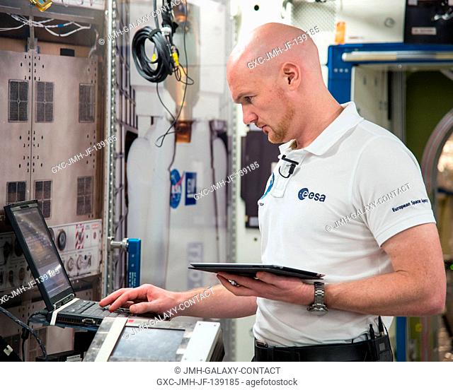 European Space Agency astronaut Alexander Gerst, flight engineer, participates in routine operations training for Expedition 41 in the Space Vehicle Mockup...