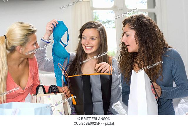 Young women show shopping spree at home