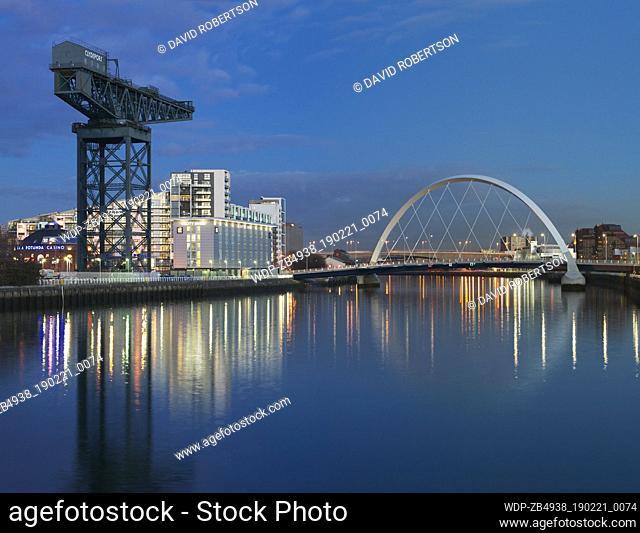 View along the River Clyde towards the Finnieston Crane, the India Quay Building and the Clyde Arc (dubbed the ""Squinty"" Bridge by the Glaswegians)