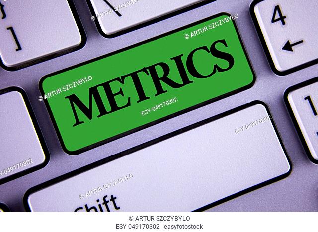Word writing text Metrics. Business concept for Method of measuring something Study poetic meters Set of numbers written Green Key Button White Keyboard with...