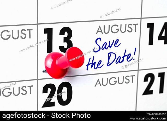 Wall calendar with a red pin - August 13
