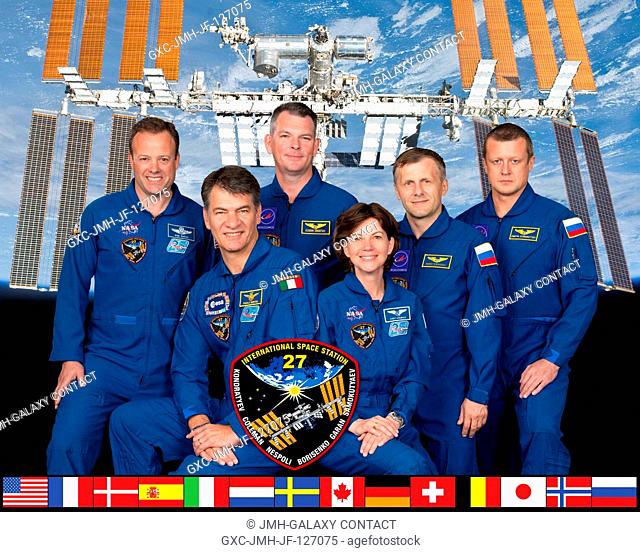 Expedition 27 crew members take a break from training at NASA's Johnson Space Center to pose for a crew portrait. Pictured from the right are Russian cosmonaut...