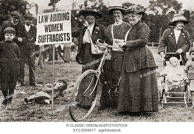 Suffragettes in 1913 holding a placard which reads: Law Abiding Women Suffragists. From The Story of Twenty Five Years, published 1935