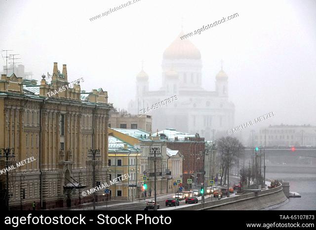 RUSSIA, MOSCOW - NOVEMBER 23, 2023: A view of the Cathedral of Christ the Saviour during a snowfall. Mikhail Metzel/TASS