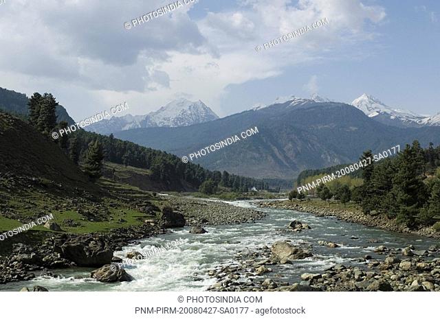 High angle view of a river with a mountain in the background, Pahalgam, Anantnag District, Jammu And Kashmir, India