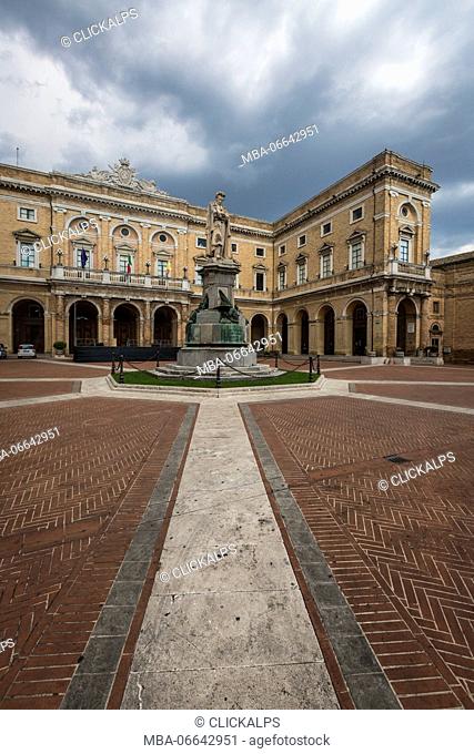 A memorial statue of the poet Giacomo Leopardi in the middle of the old square Recanati Province of Macerata Marche Italy Europe
